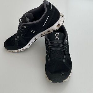 On Running Women’s Black and White Athletic Shoes